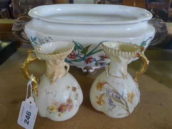 Pair of Worcester blush ivory jugs and an elephant- handled jardiniere